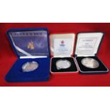 Three silver proof £5 coins, struck by The Royal Mint 1997, 1999 and 2000