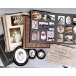 Four albums dating from the early 20th century containing black and white photographs, a special