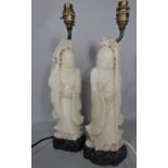 A pair of carved soapstone Chinese sages converted to lamps 49 cm overall