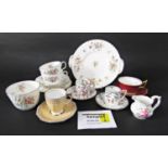 A collection of Minton Marlow pattern tea wares comprising cake plate, milk jug, sugar bowl, six