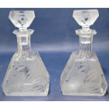 A pair of art deco glass decanters in the Sunburst pattern, 22cm x 12cm