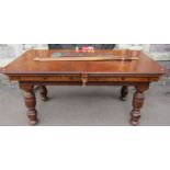 A quarter size oak snooker dining table with slate bed and raised on four turned baluster