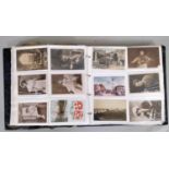 An album containing a large collection of mixed postcards, subjects include romantic, topographical,