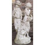A cast composition stone figure group, male and female characters standing beside a tree stump, 90