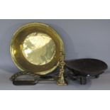 A brass metal basin (AF), a pair of brass candlesticks, brush and slide and a wooden tribal bowl