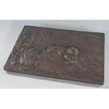 A bronze plaque of a pointer retrieving game from the bullrushes, bears signature Barye 14.5 cm wide