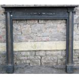 A cast iron fire surround/chimney piece with classical raised foliate detail to frieze flanked by