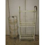 A vintage 'Happy Maid' wire work floorstanding vegetable rack with removable circular baskets