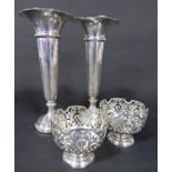 A pair of silver posy vases with flared lips, 21 cm high, Sheffield 1932 and a pair of pierced bon