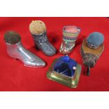Five vintage novelty pin cushions presented as shoes, pair of bellows, etc
