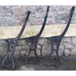 A set of three cast iron bench ends/supports, possibly ex railway platform