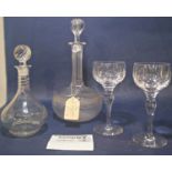 A pair of Victorian decanters, five further 19th century decanters, six 20th century wine glasses,