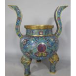 A Chinese cloisonné enamelled koro incense burner with gilt lion mask detail to the feet and swept