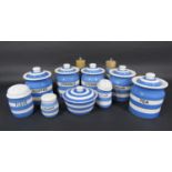 A collection of TG Green and other Cornish ware blue and white banded kitchen wares comprising a