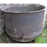 An old cast iron cauldron with flared rim, (AF), 84 cm diameter x 66 cm in height