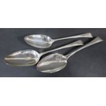 A pair of Georgian serving spoons, London 1804 and a third Georgian serving spoon, London 1813, 4.