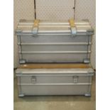 Three Zarges aluminium and two partially wooden lathe bound trunks of varying size and design