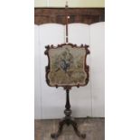 Victorian face screen with rosewood framework upon a tripod base, the screen in tapestry showing