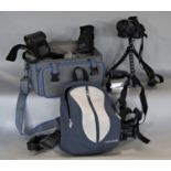 Photographic equipment including a Nikon D3000, a Sony Handycam, battery packs and flash guns etc