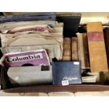 A leather suitcase containing an autograph album, books, 78rpm records, a vintage radio etc