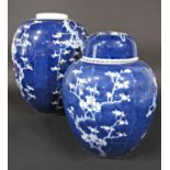 A large oriental blue and white vase with prunus blossom decoration, 34cm approx, together with a