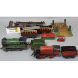 Collection of 0 gauge Hornby rail items including 0-4-0 clockwork tank locomotive no 1824 with