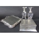 A silver Walker & Hall cigarette box, a silver framed mirror and a pair of glass vases with flared