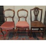 Two Lancashire style wavy ladderback open armchairs with rush seats together with a pair of