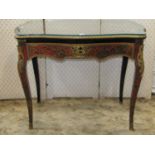 A 19th century ebonised boule work centre table with serpentine outline, decorative scrolling