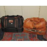 A set of Thomas Taylor lignoid lawn bowls and shoes contained in a holdall, together with a