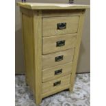 A contemporary light oak Arts & Crafts style chest of five long drawers 57 cm wide x 42 cm deep x