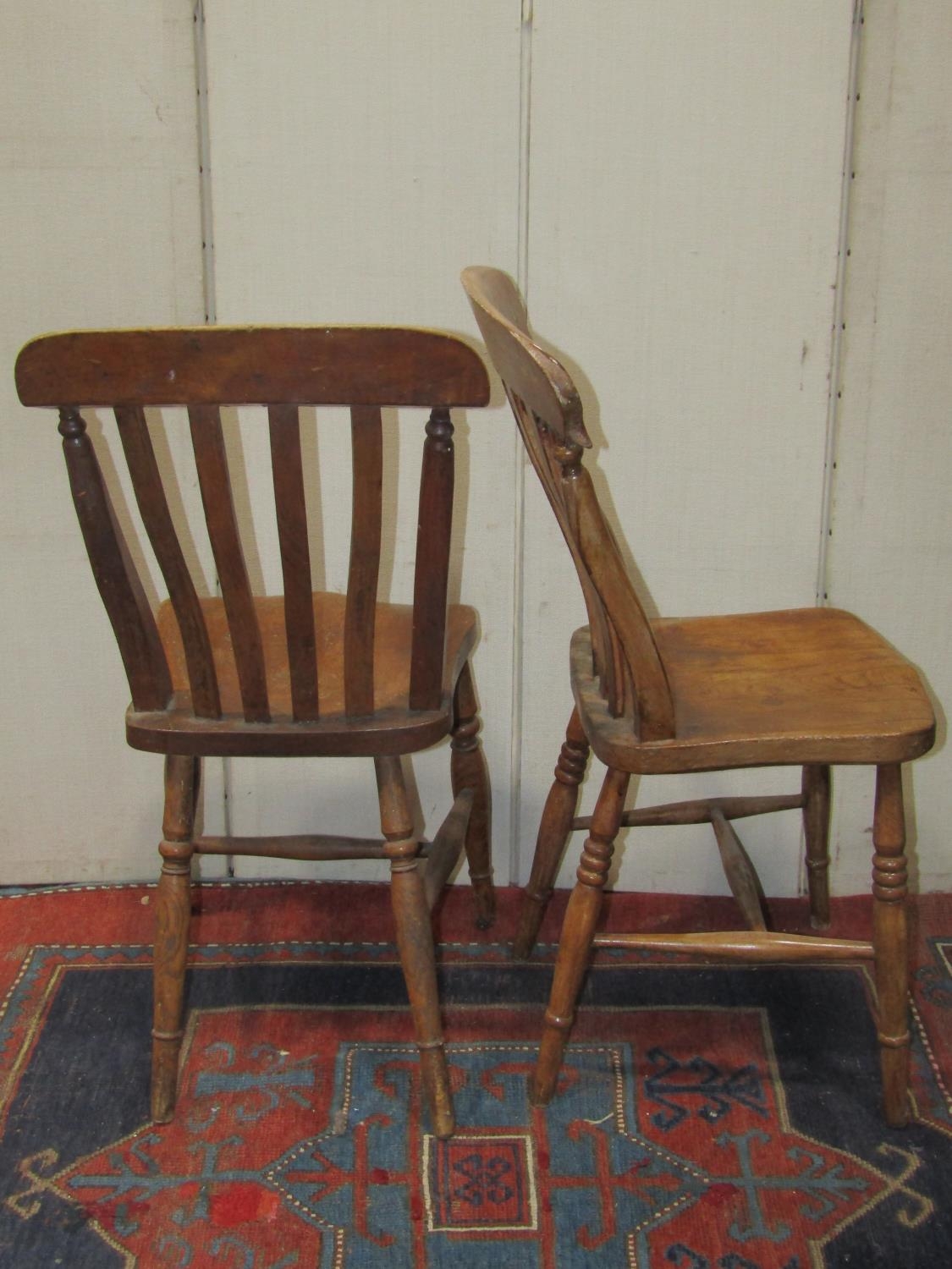 A harlequin set of eight Windsor elm and beechwood lathe back kitchen chairs raised on turned - Image 2 of 2