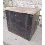 A 19th century stained pine blanket box with hinged lid and drop side iron work carrying handles,