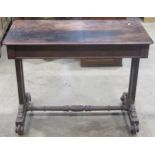 A 19th century rosewood side table of rectangular form with moulded outline, fitted with two