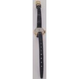 A Roamer ladies wristwatch with gold case and leather strap