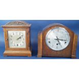A small oak bracket clock, the case with arched outline, enclosing a single train movement, together