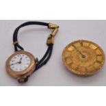 Vintage ladies wristwatch with 9ct gold casework and leather strap, 20g gross; together with a