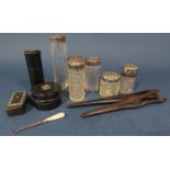 Six silver capped dressing table jars, a pair of ebony glove stretchers, an ebony trinket box, etc