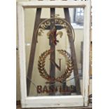 Two vintage French restaurant windows with Parisian address, fleur de lys, cutlery and other detail,