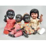 Collection of vintage black dolls in hard plastic including a pair of small British made dolls