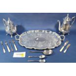 A large oval silver plate galleried tray, a smaller similar, a scalloped edged tray, a tea service