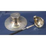 A silver ship's ink well, hallmarks rubbed and an un-hallmarked toddy ladle (2)