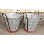 Two pierced galvanised tin potato baskets with fixed loop handles