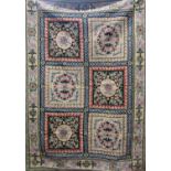 An Kashmiri hand stitched wool chain hanging with floral panels, 179cm x 121cm