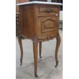 A late 19th century walnut pot cupboard of square cut form with white and grey flecked marble top