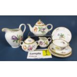 A collection of Bavarian teawares with painted floral decoration comprising teapot and cover, pair