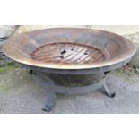 A shallow circular steel fire bowl and stand 74 cm in diameter x 30 cm high