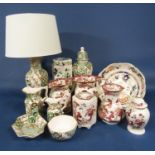 A collection of Masons Ironstone Applique pattern wares comprising a lamp base, a vase and cover