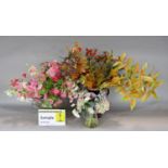 Collection of faux flowers by Bloom with examples of foxgloves, peonies, sweet peas etc.