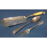 A silver serving spoon, Newcastle 1941, a silver fork London 1827 and a silver plate crumb tray with